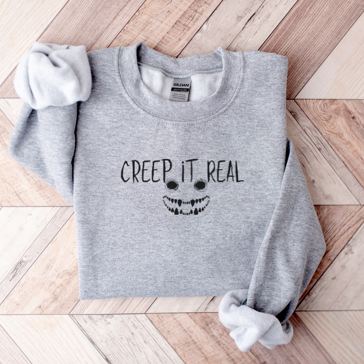 Creep it Real Face Embroidered Sweatshirt